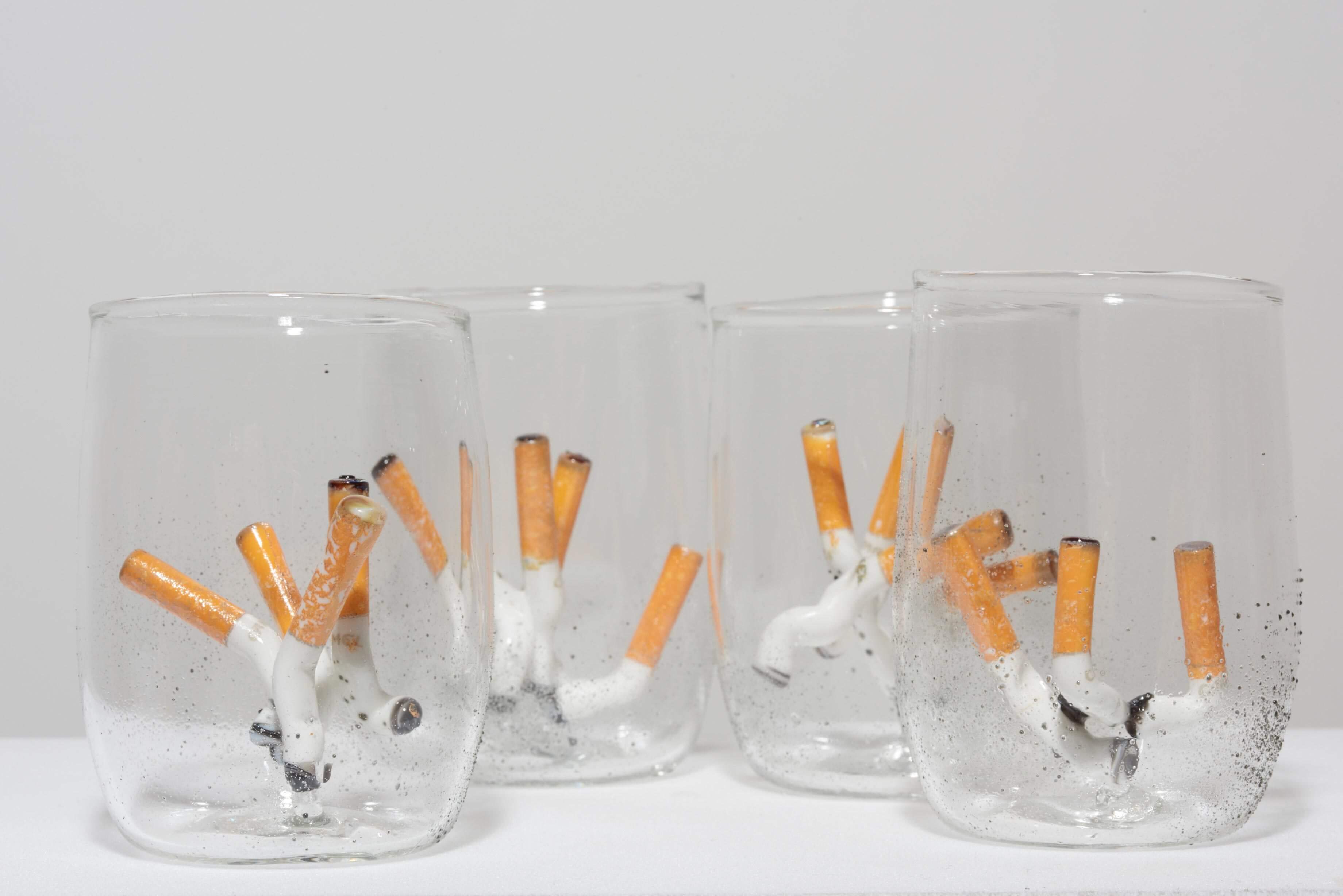 Phillipa Horan, The Bottom of the Butt Tastes Better after Wine (2015) Handblown glass, glass cigarettes