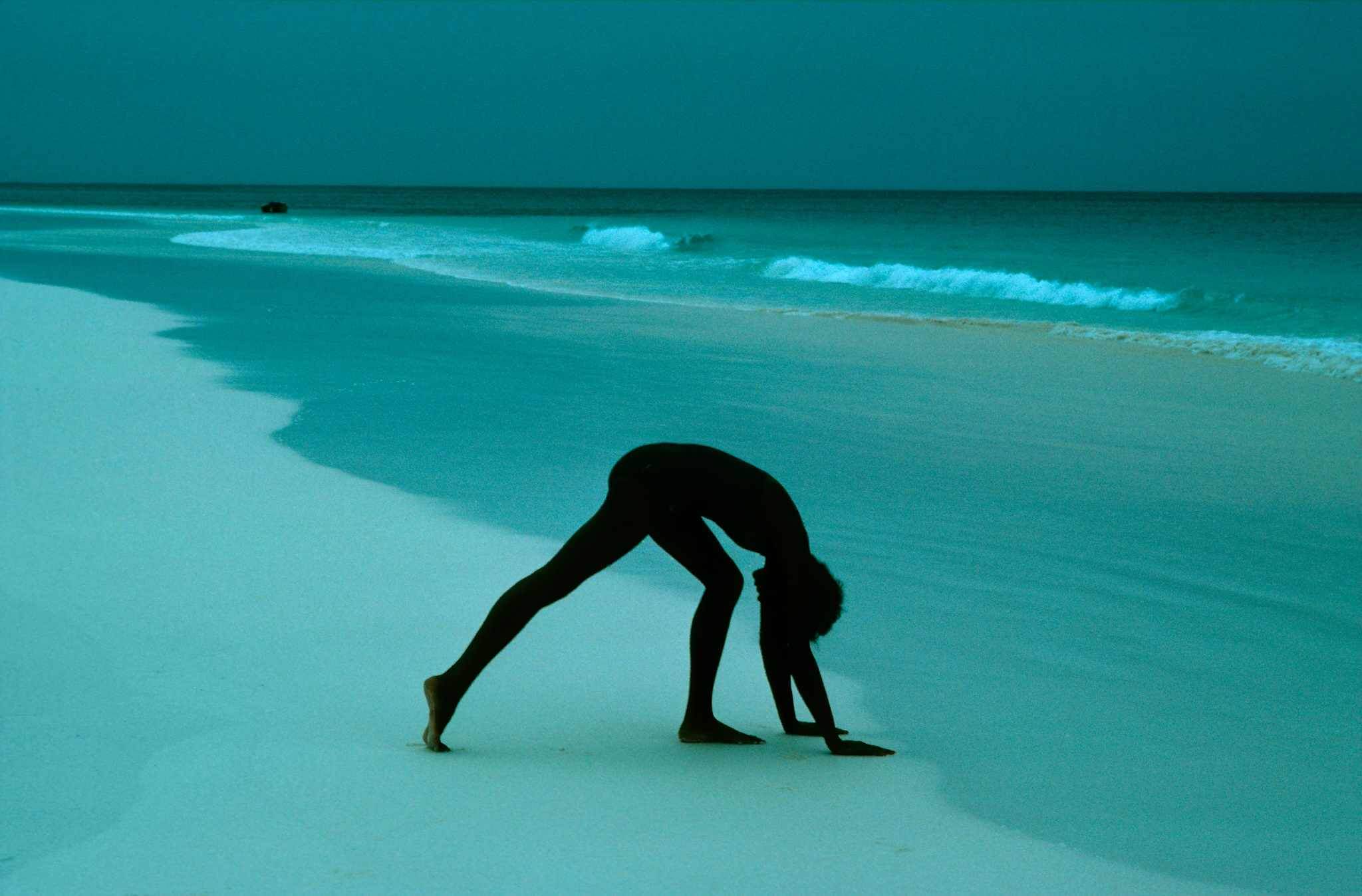 Frank Horvat, Bahamas, for Glamour USA, illustration for exercise on the beach, 1976